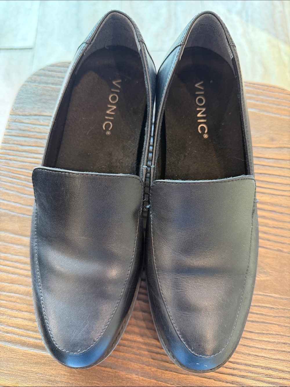 Vionic women’s Black Leather Slip-On Loafers - Classic Moc Toe